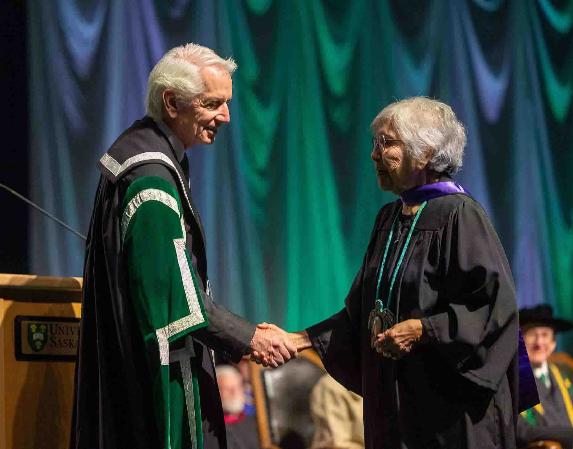 Louisa Fraser accepts her degree from University of Saskatchewan president Peter Stoicheff